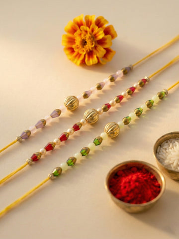 KARATCART Set of 3 Green Red and Purple Beaded Rakhi for Brother with Roli & Chawal
