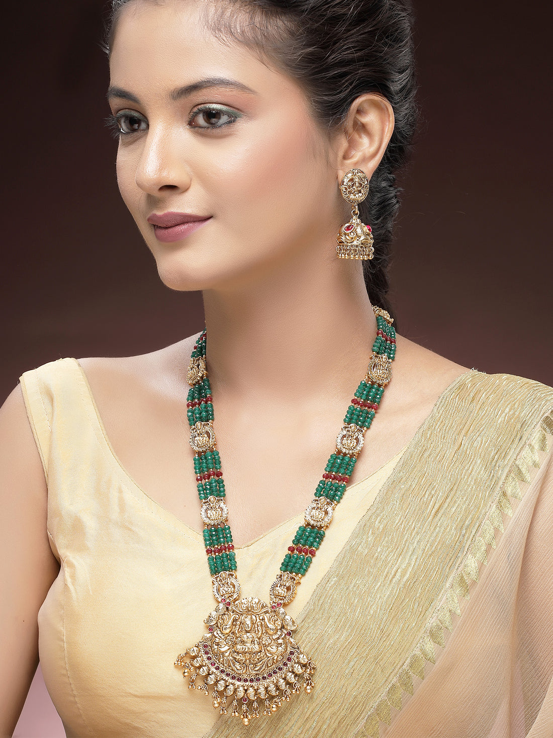 KARATCART Traditional Gold Plated Green Crystal Laxmi Mata Rani Haar Temple Jewellery Set
