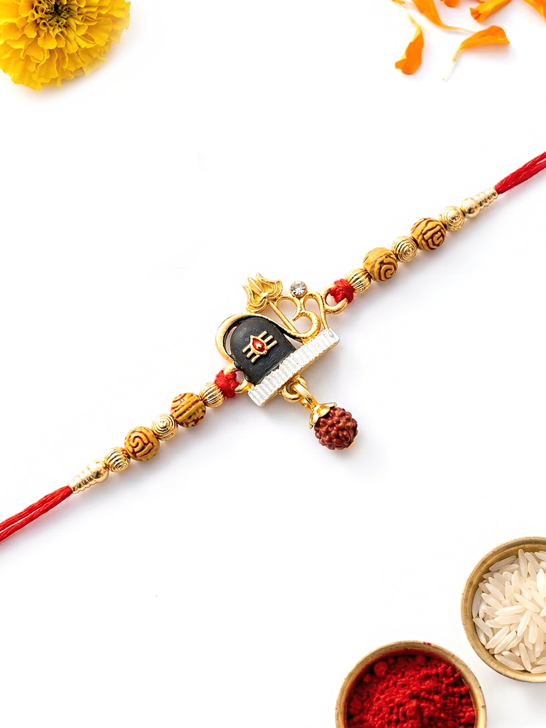 KARATCART Designer Gold Plated Rudraksha Studded Shivling Bhaiya Rakhi with Roli & Chawal