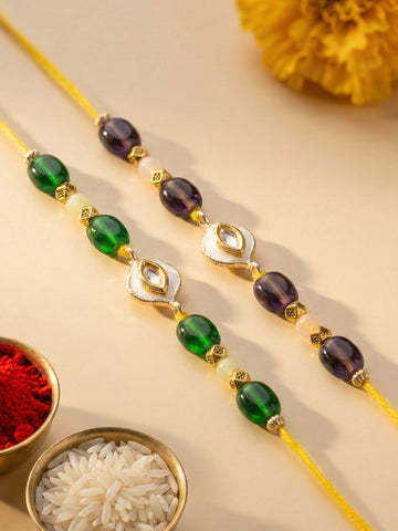 KARATCART Set of 2 Green and Purple Beaded Kundan Rakhi for Brother with Roli & Chawal