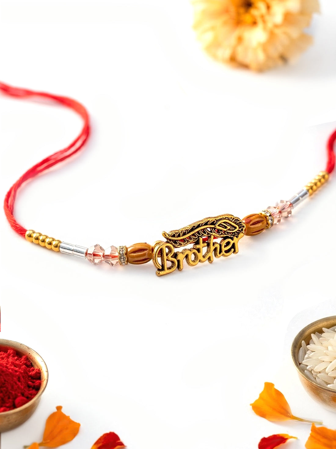 KARATCART Gold Plated Brother Letter with Mor Pankh Designer Bhaiya Rakhi with Roli & Chawal