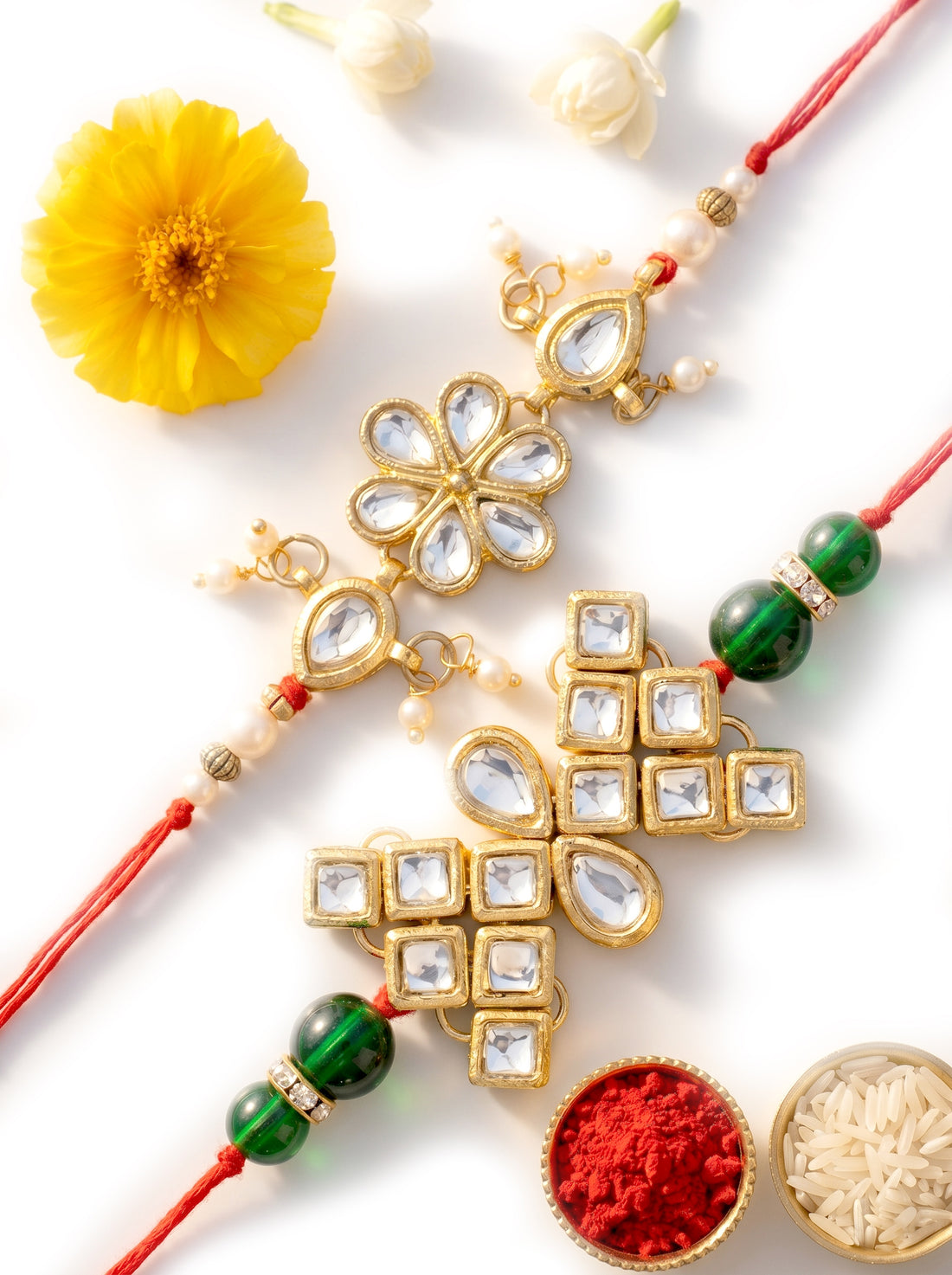 KARATCART Set of 2 Gold-Plated Floral Kundan Rakhi with Roli Chawal for Brother