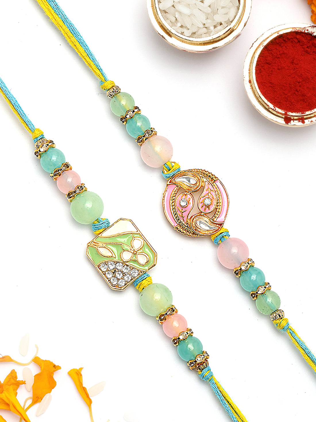 KARATCART Set of 2 Green and Pink Enamel Kundan Rakhi for Brother with Roli & Chawal