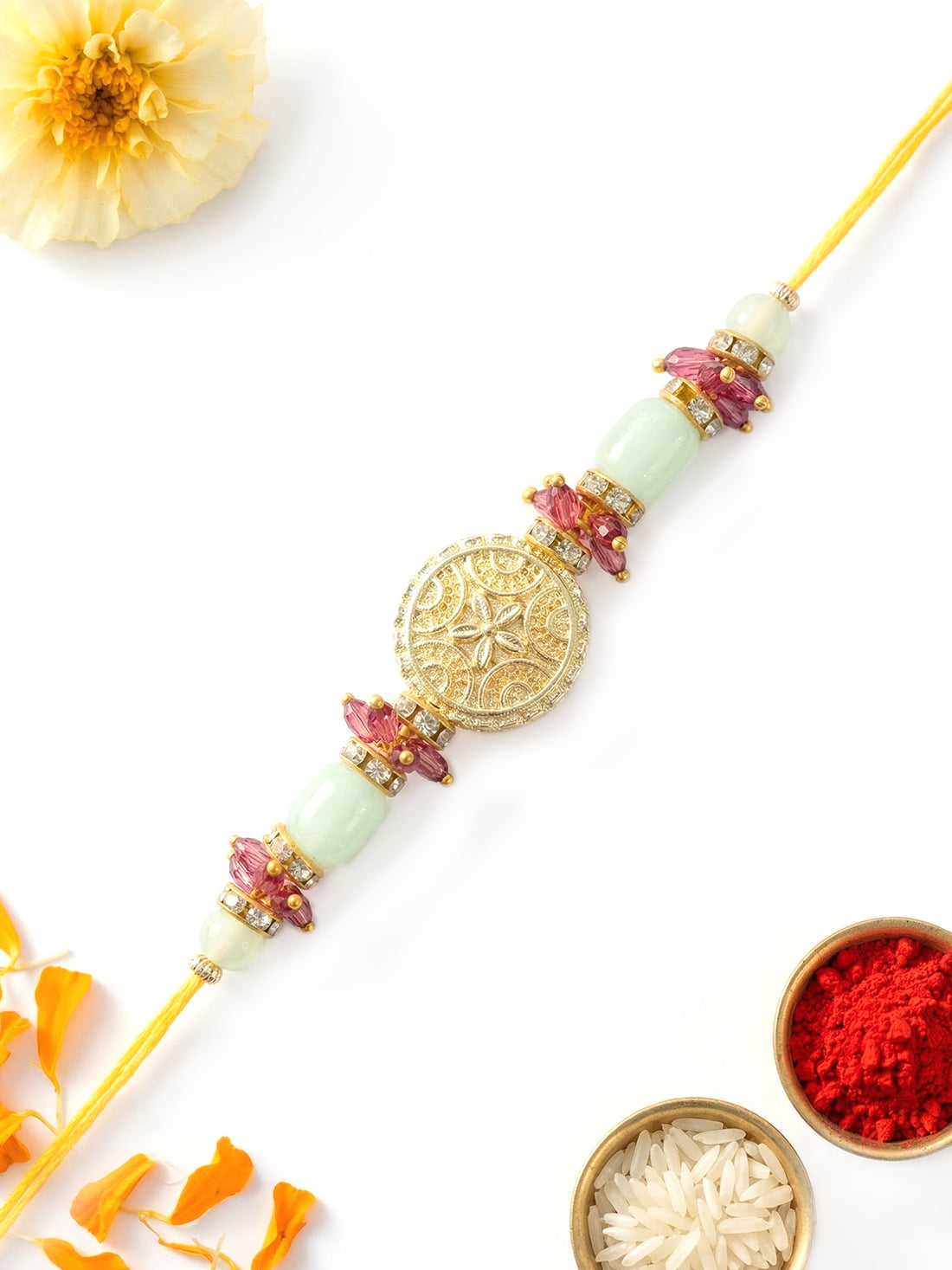 KARATCART Gold Plated Sea Green Beads and Pink Crystal Kundan Bhaiya Rakhi with Roli & Chawal