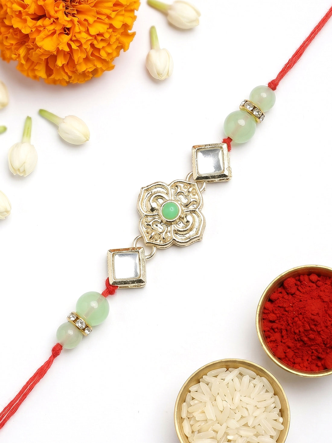 KARATCART Beautiful Floral Design Light Green Kundan Handmade Rakhi for Brother with Roli & Chawal