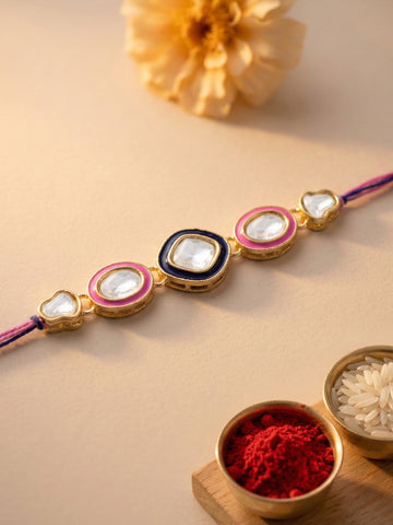 KARATCART Gold Plated Pink and Blue Meena Kundan Bhaiya Rakhi with Roli & Chawal