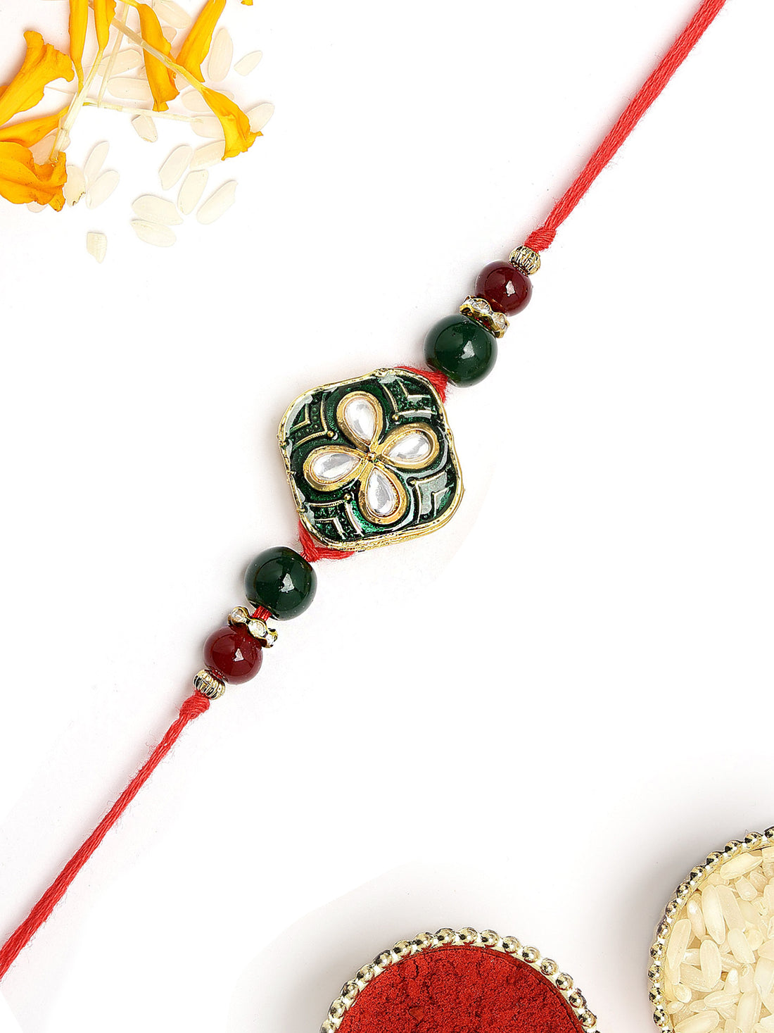 KARATCART Traditional Green Meena Floral Design Handmade Kundan Rakhi for Brother with Roli & Chawal