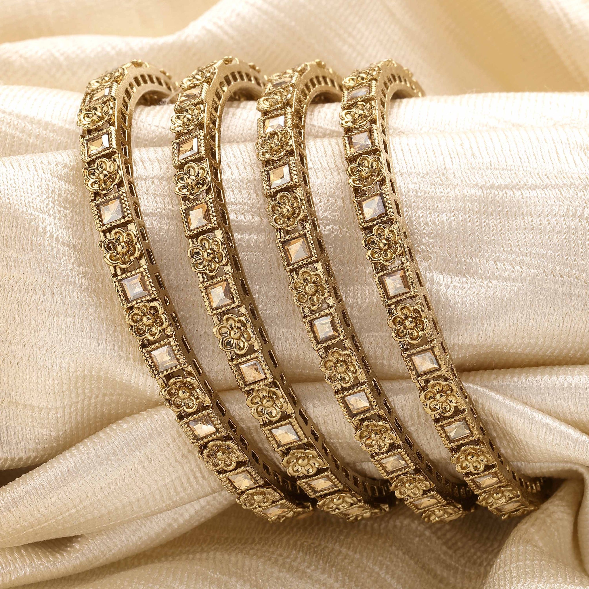 Karatcart Antique Gold Plated Floral Design Set of 4 Bangles for Women