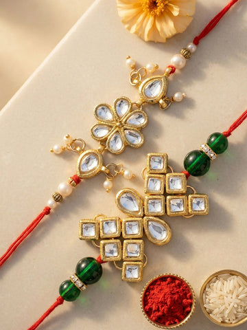 KARATCART Set of 2 Gold-Plated Floral Kundan Rakhi with Roli Chawal for Brother