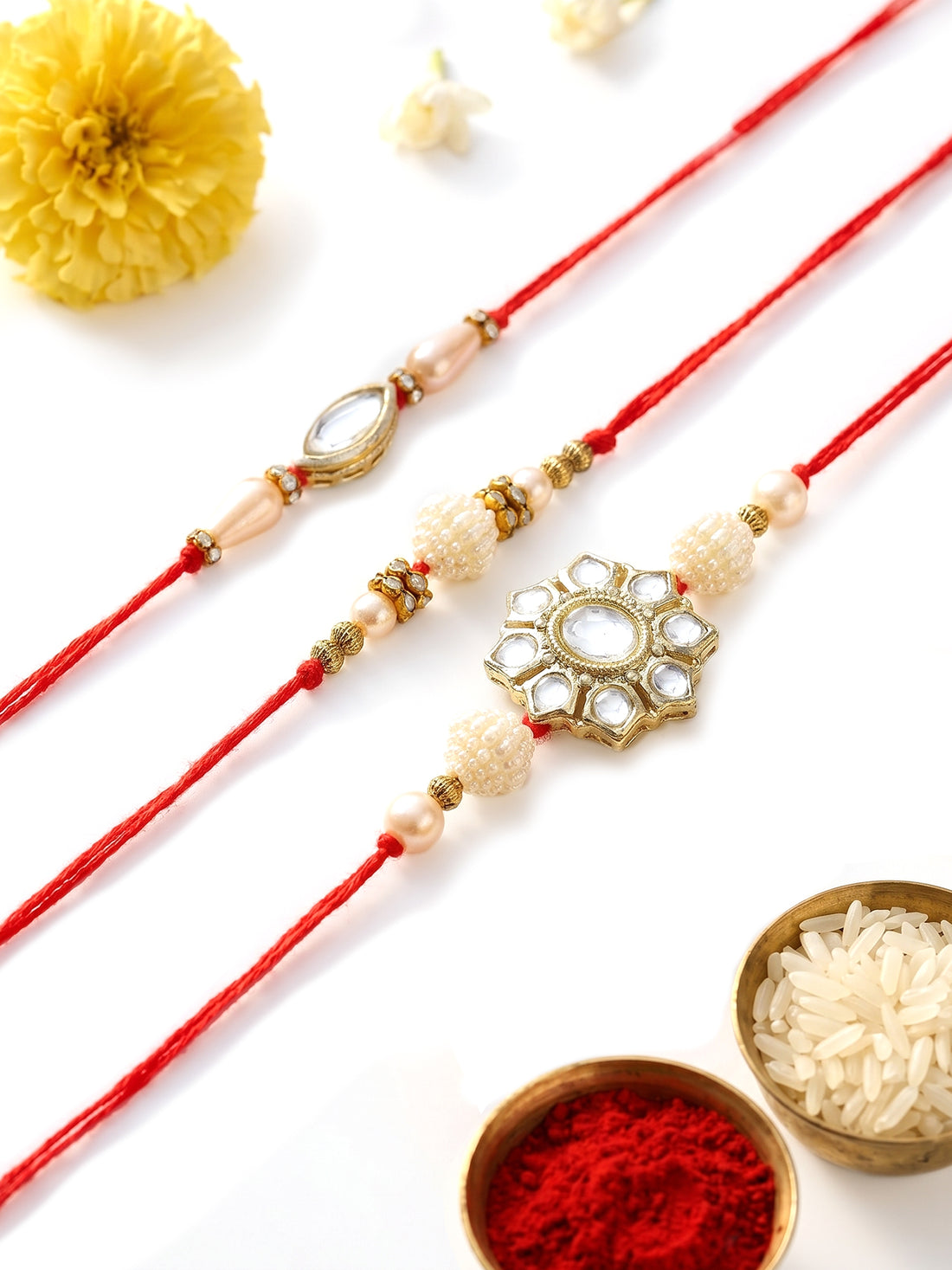 KARATCART Set of 3 Handmade Floral Pearl and Kundan Rakhis for Brother with Roli and Chawal