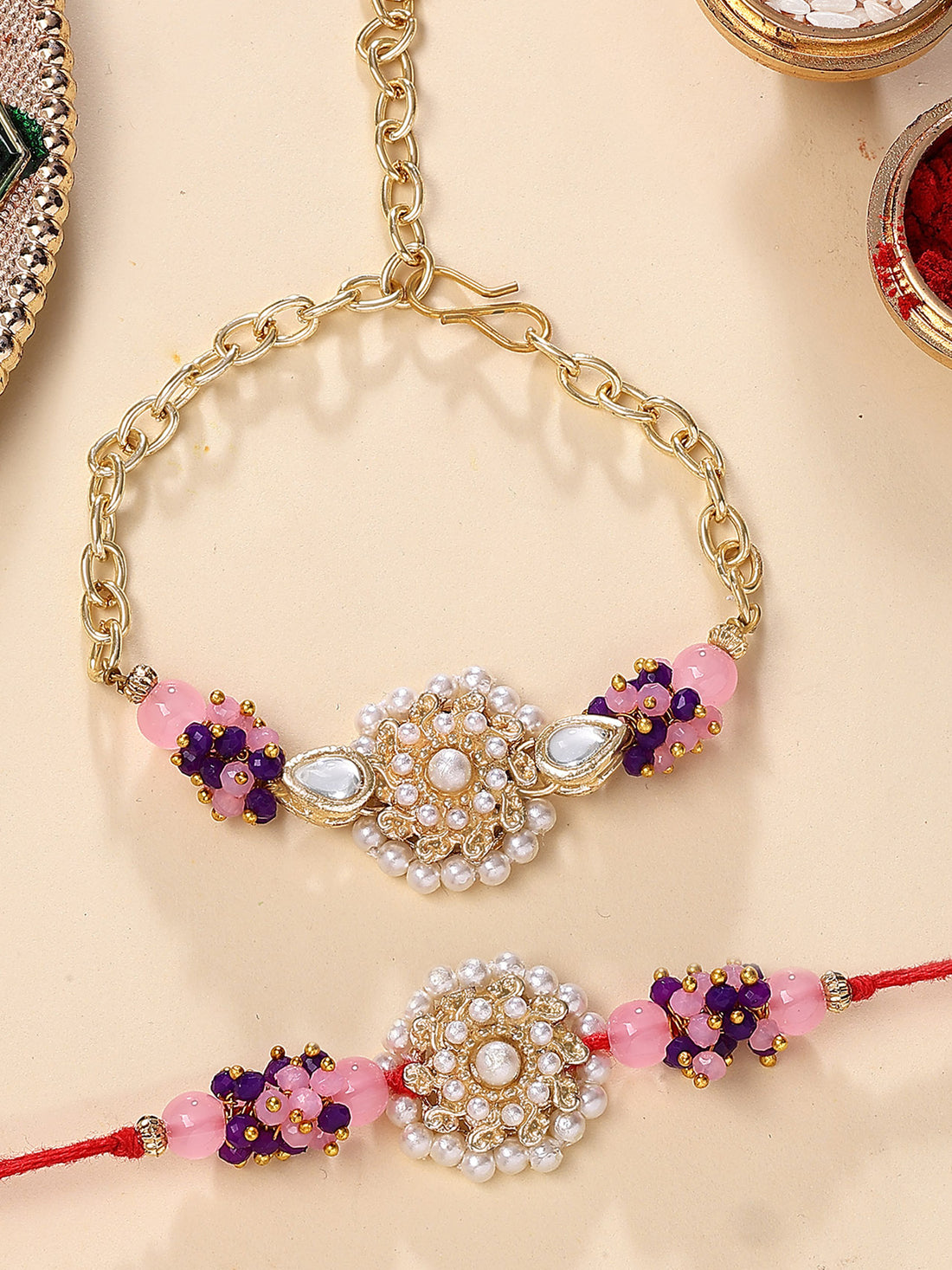 Karatcart Gold Plated Pink and Purple Crystal Kundan Bhiya Bhabhi Rakhi with Roli & Chawal