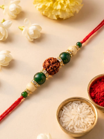 KARATCART Gold Plated Rudraksha and Green Beads Bhaiya Rakhi with Roli & Chawal