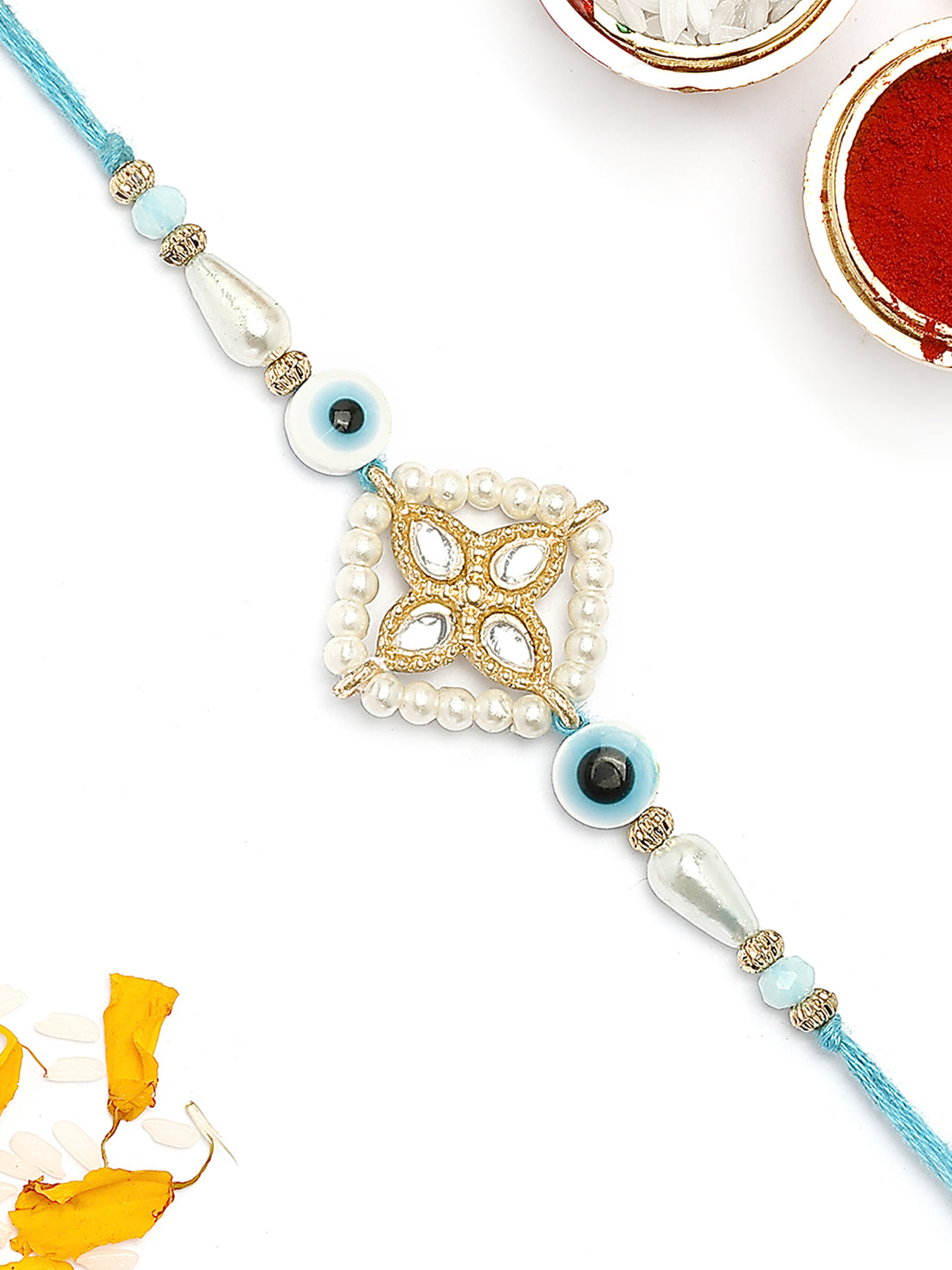 KARATCART Blue Evil Eye and Pearl Kundan Rakhi for Brother with Roli & Chawal