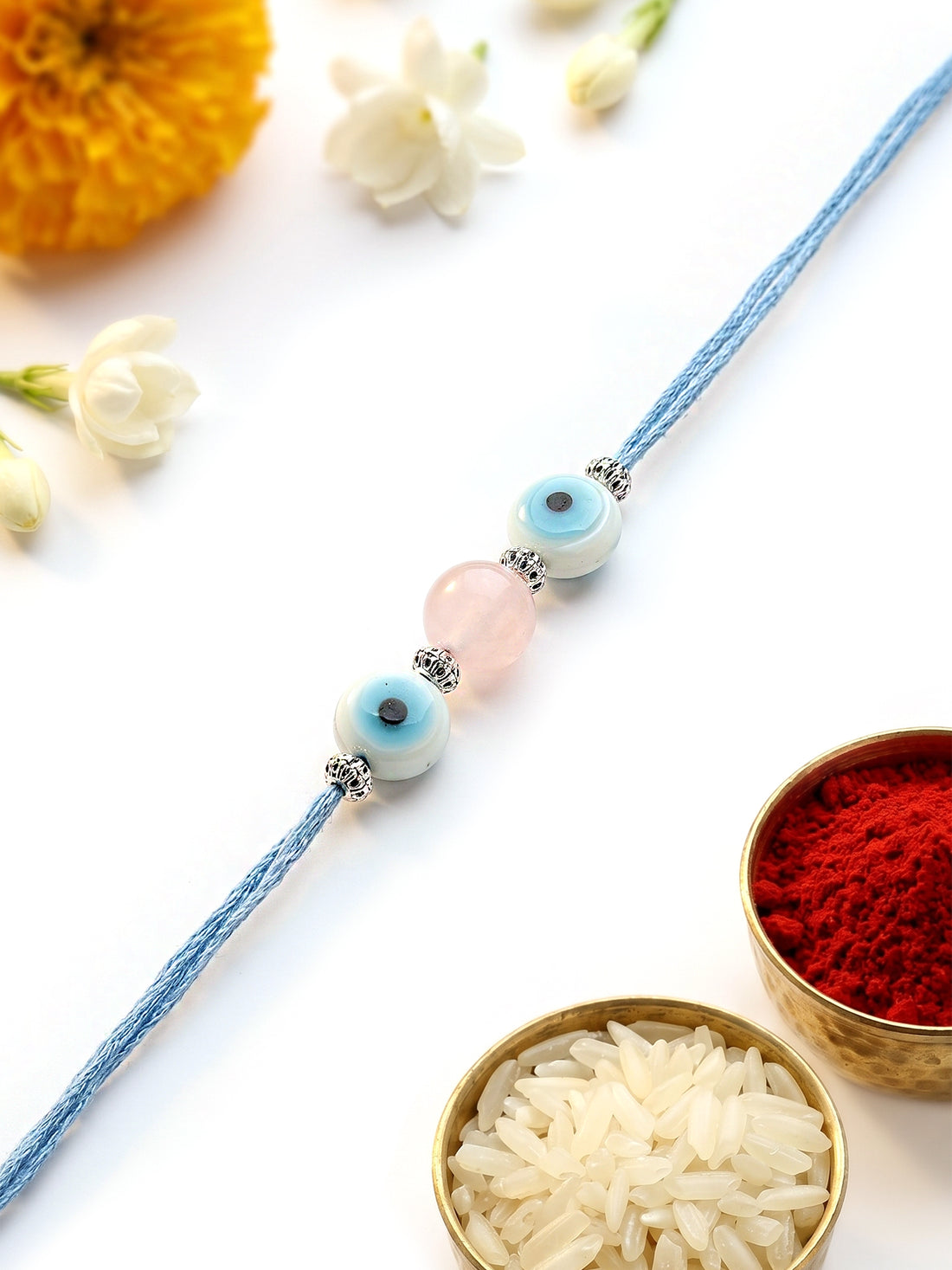KARATCART Elegant Pink Bead Handmade Evil Eye Rakhi for Brother with Roli & Chawal