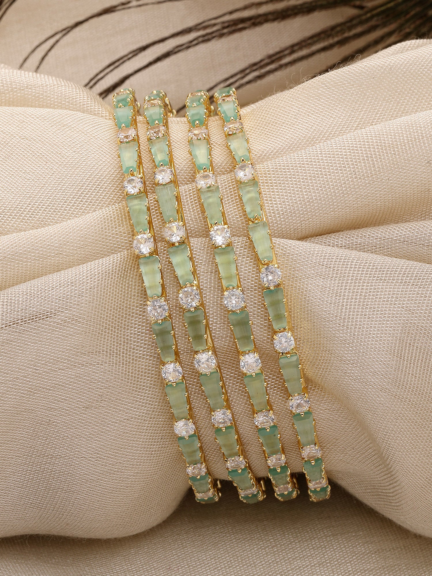 Karatcart Set of 4 Gold Plated Lime Green CZ Studded Bangles for Women