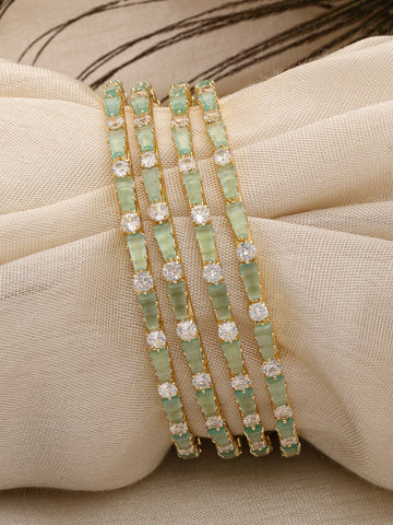 Karatcart Set of 4 Gold Plated Lime Green CZ Studded Bangles for Women