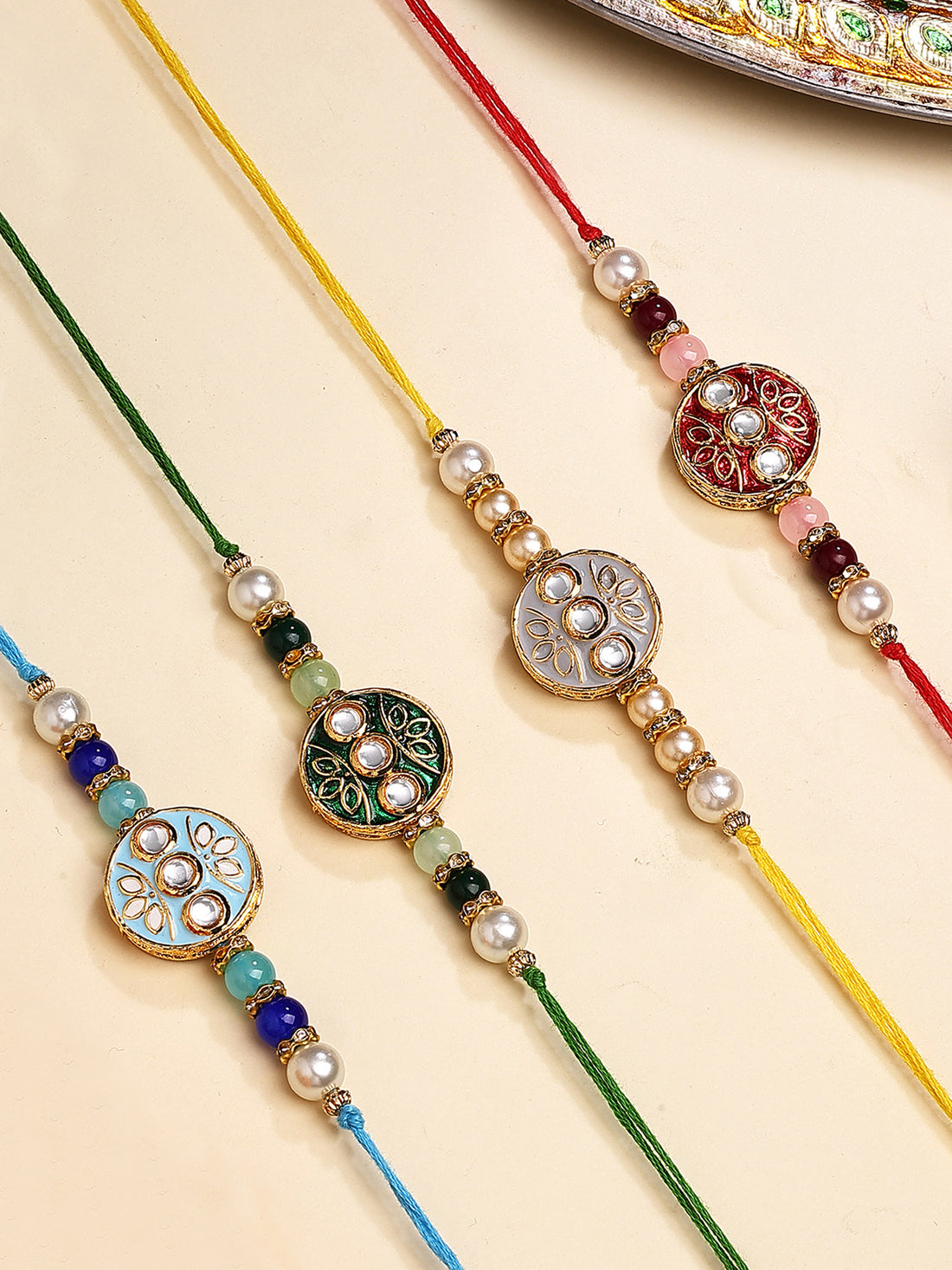 Karatcart Set of 4 Round Floral Design Enamel Kundan Rakhi for Brother with Roli & Chawal