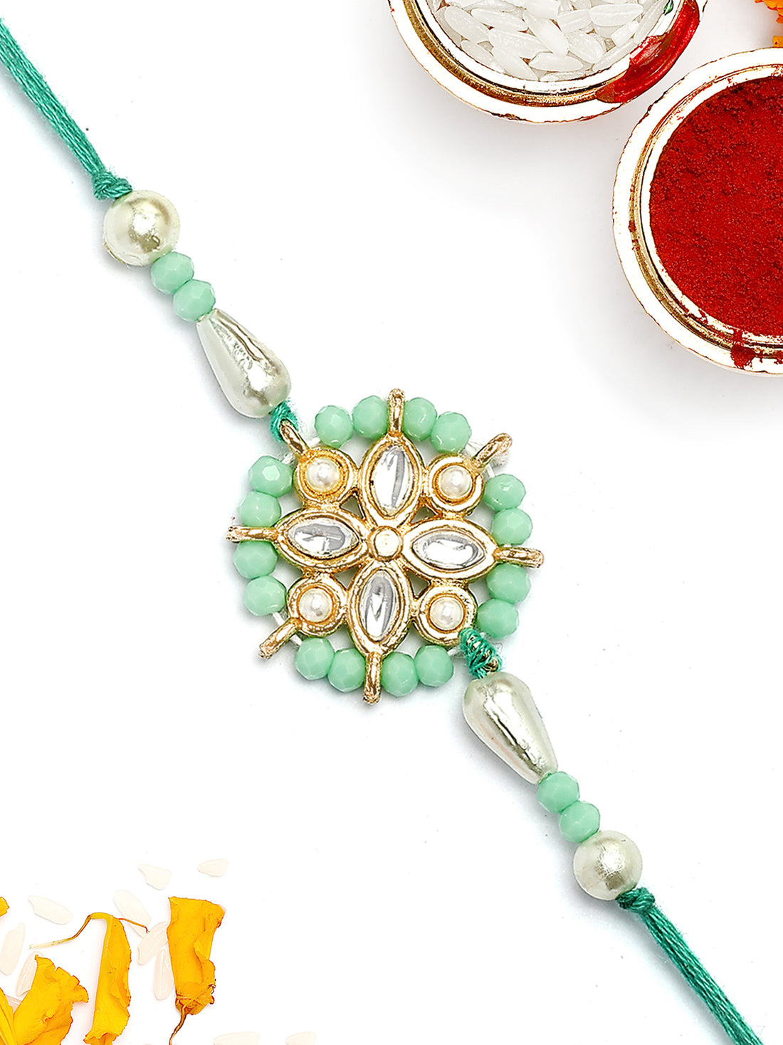 KARATCART Gold Plated Light Blue Crystal Floral Kundan Bhaiya Rakhi with Roli & Chawal