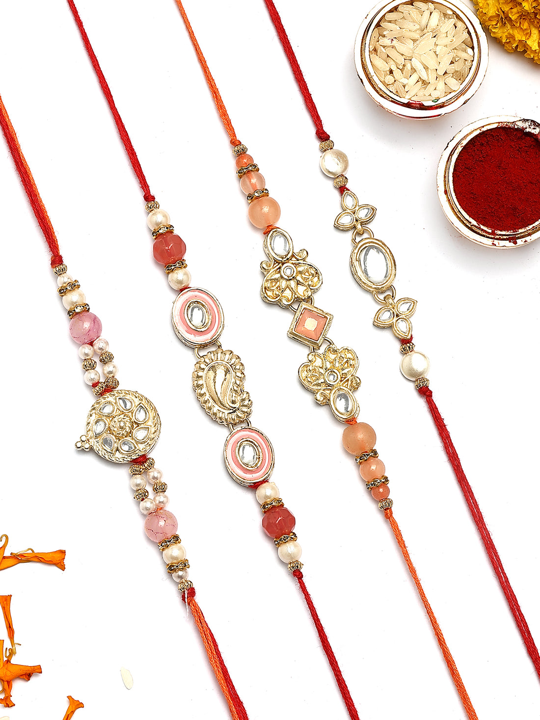 KARATCART Set of 4 Pink Pearl Beaded Designer Kundan Rakhi for Brother with Roli & Chawal