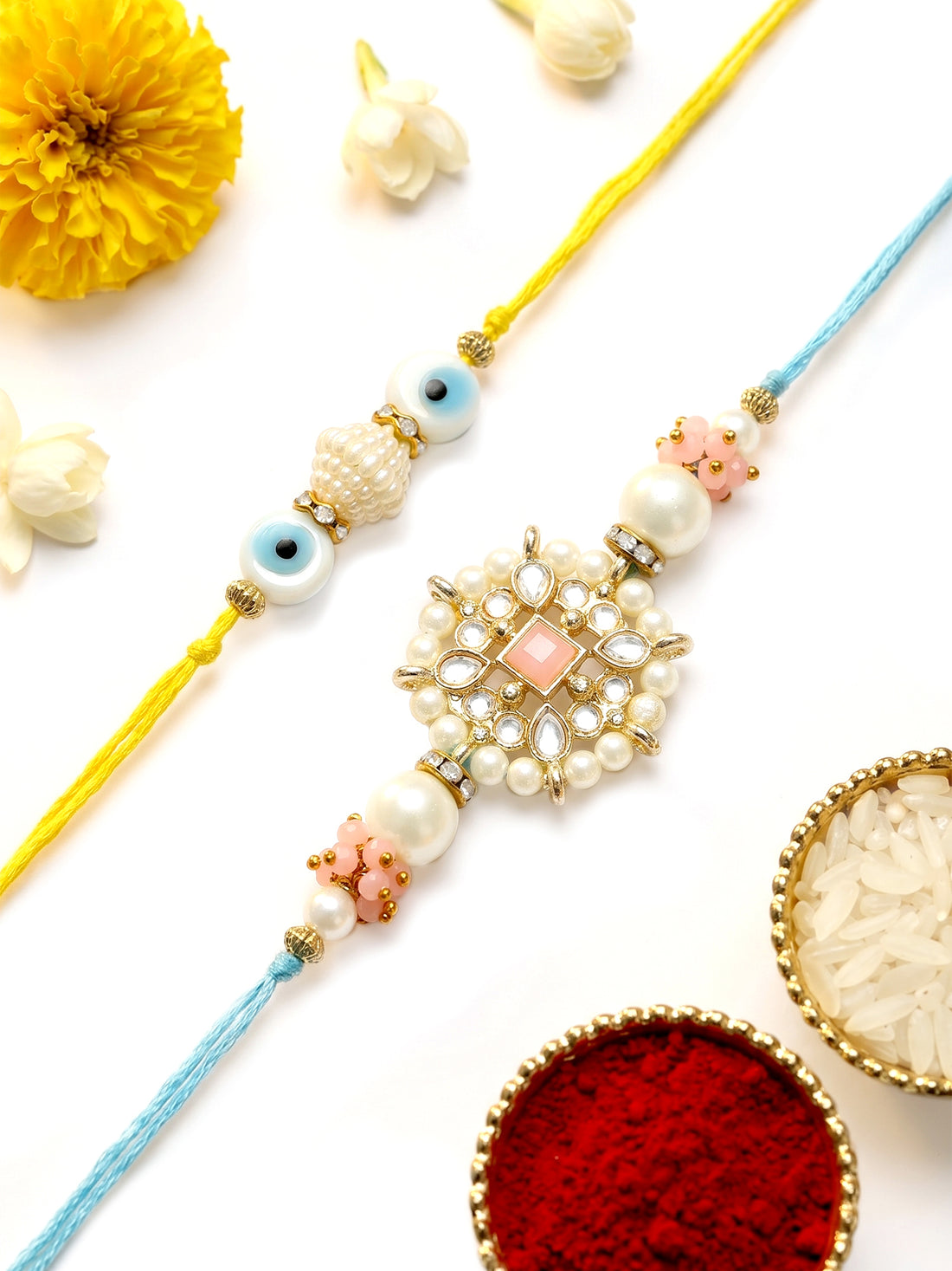 KARATCART Set of 2 Evil Eye and Pink Floral Kundan Handmade Rakhi for Brother with Roli & Chawal