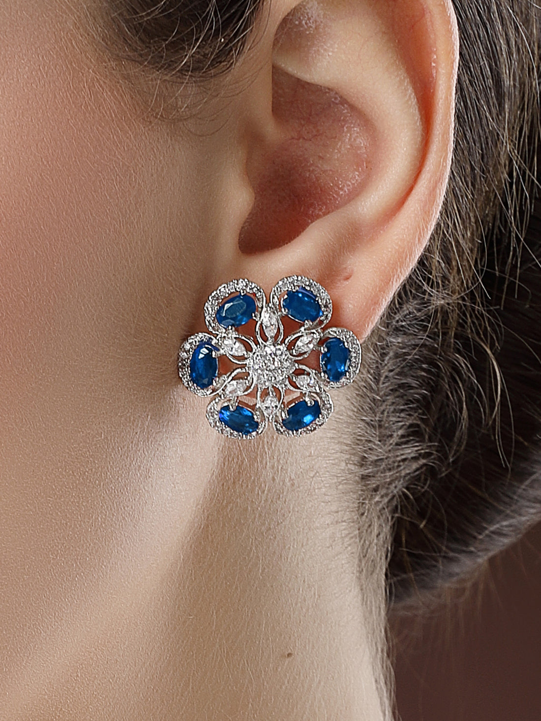 Karatcart Designer Floral Design Blue American Diamond Stud Earrings for Women