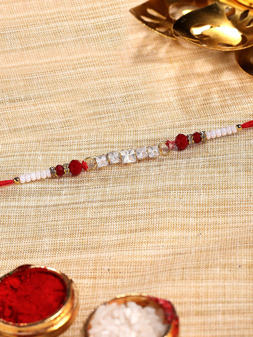 KARATCART Red Crystal and Rhinestones Bhaiya Rakhi with Roli & Chawal