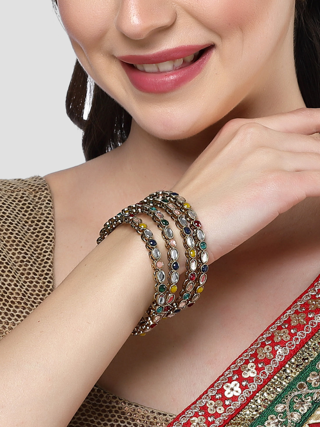 Karatcart Gold Plated Set of 4 Oval Shape Multicolor Stone Studded Bangles for Women