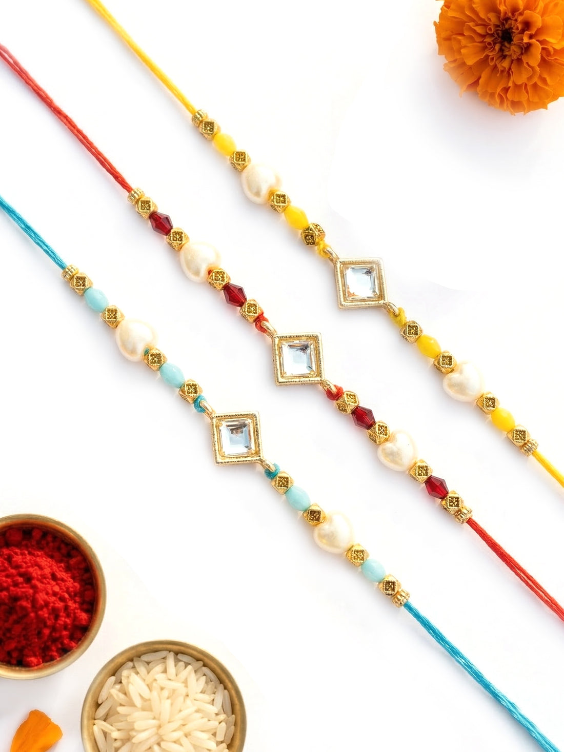 KARATCART Set of 3 Yellow Red & Blue Beaded Square Kundan Rakhi for Brother with Roli & Chawal