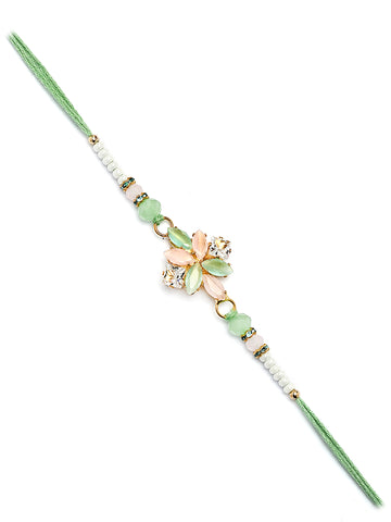 Karatcart Lime Green and Peach Rhinestones Floral Bhiya Rakhi with Roli & Chawal