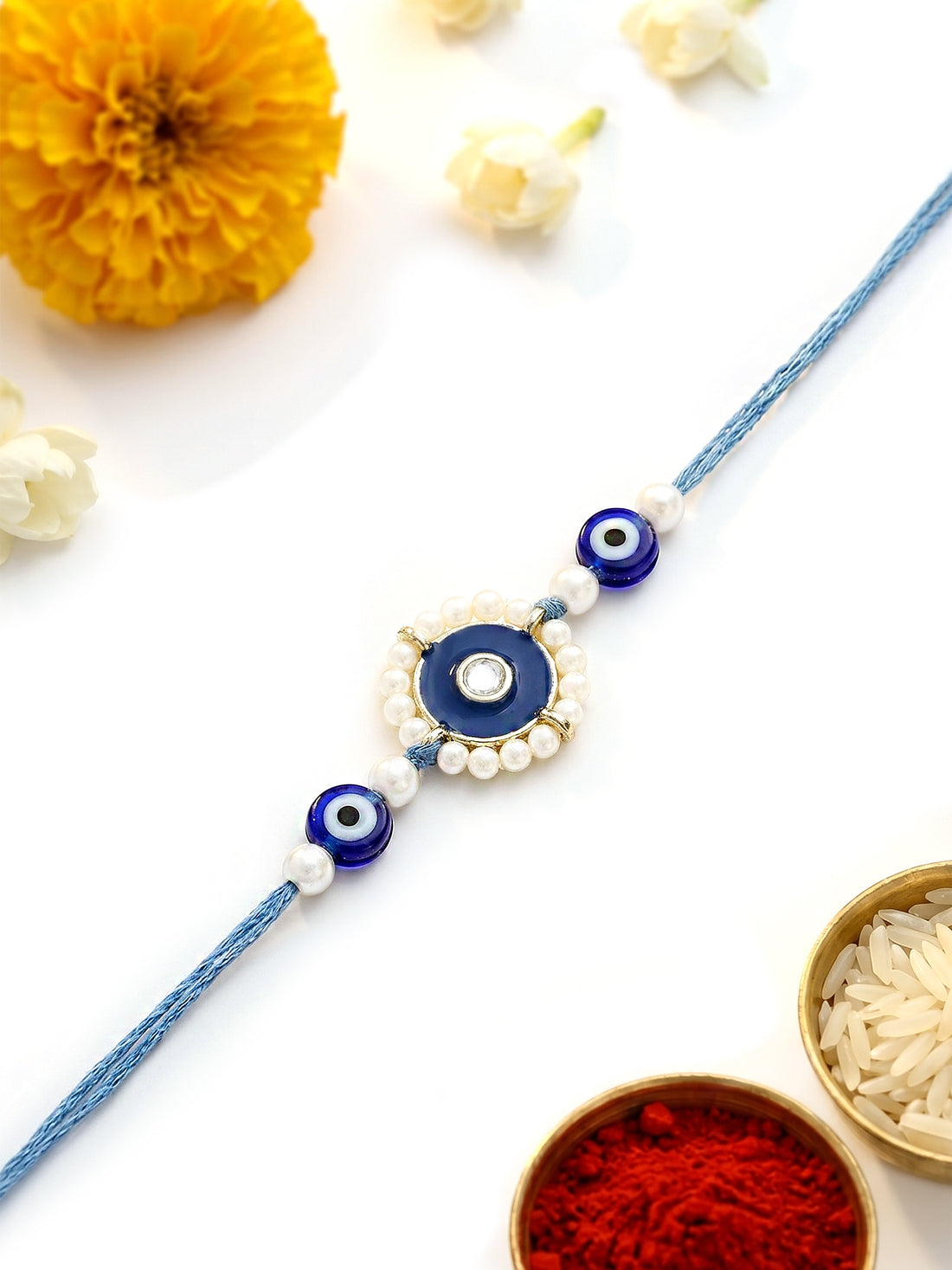 KARATCART Blue Meena Evil Eye Design Handmade Kundan Rakhi for Brother with Roli & Chawal