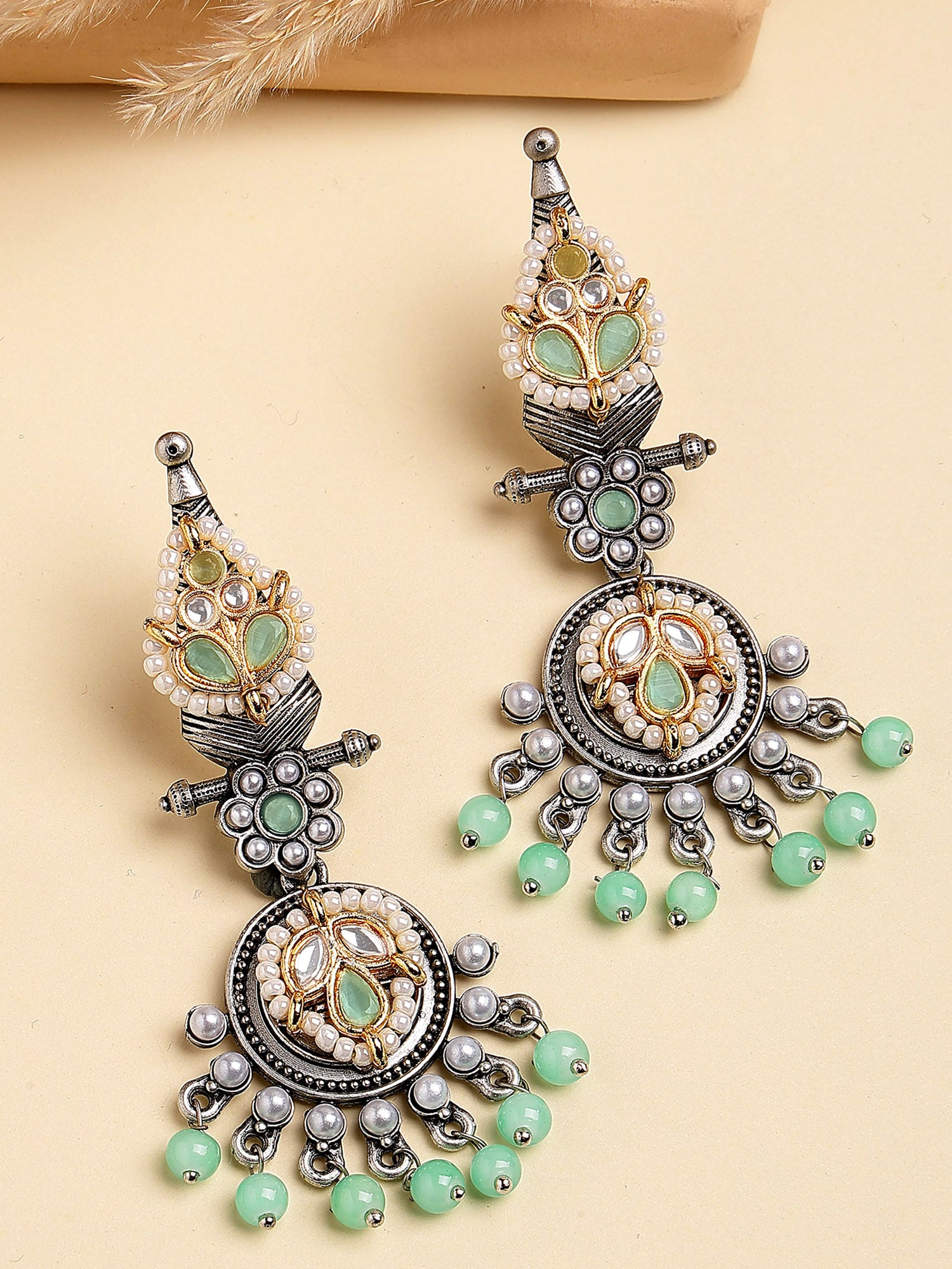 Karatcart Traditional Oxidized Silver Earrings with Mint Green Beads and Floral Motif