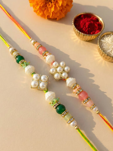 KARATCART Set of 2 Pearl Beads Floral Design Rakhi for Brother with Roli & Chawal