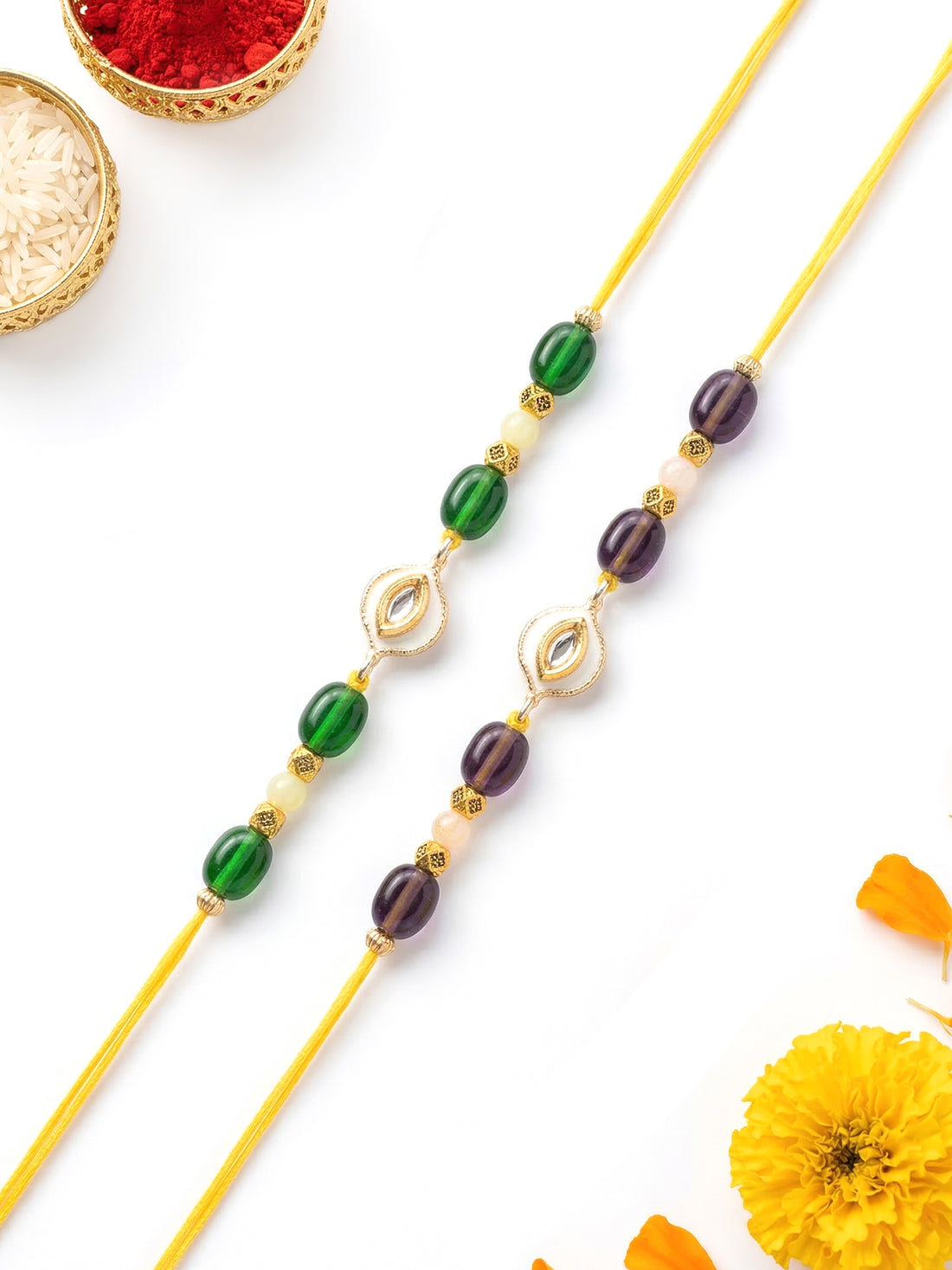 KARATCART Set of 2 Green and Purple Beaded Kundan Rakhi for Brother with Roli & Chawal