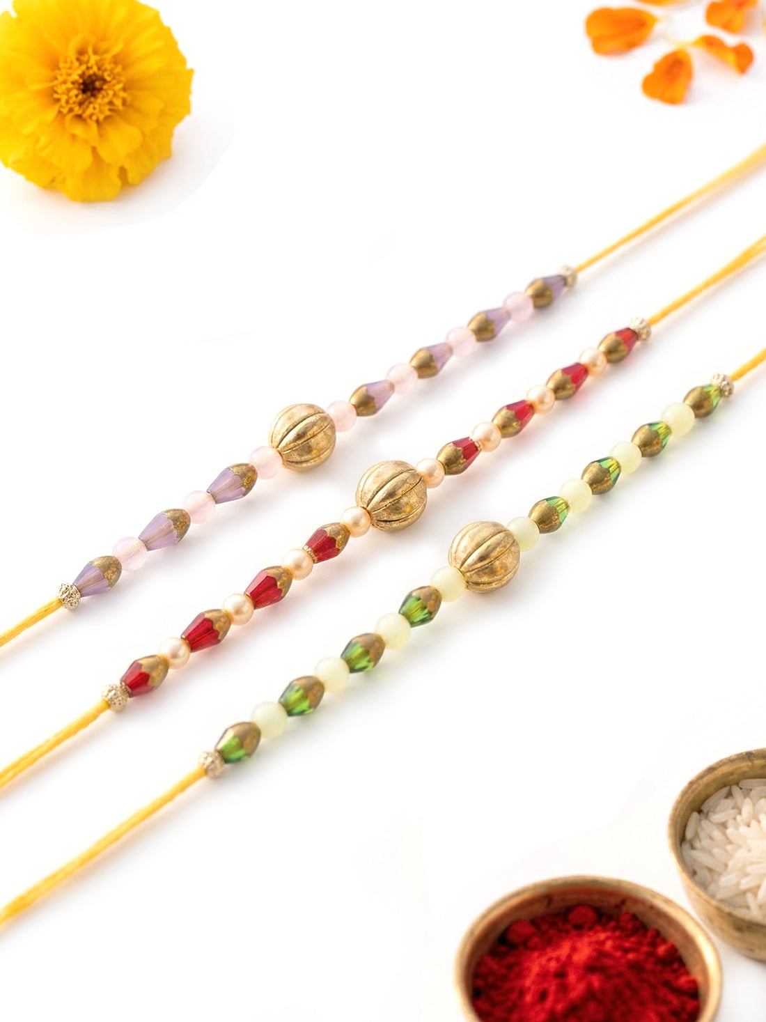 KARATCART Set of 3 Green Red and Purple Beaded Rakhi for Brother with Roli & Chawal