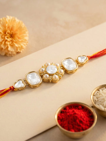 KARATCART Gold Plated Pearl Studded Floral Kundan Bhaiya Rakhi with Roli & Chawal