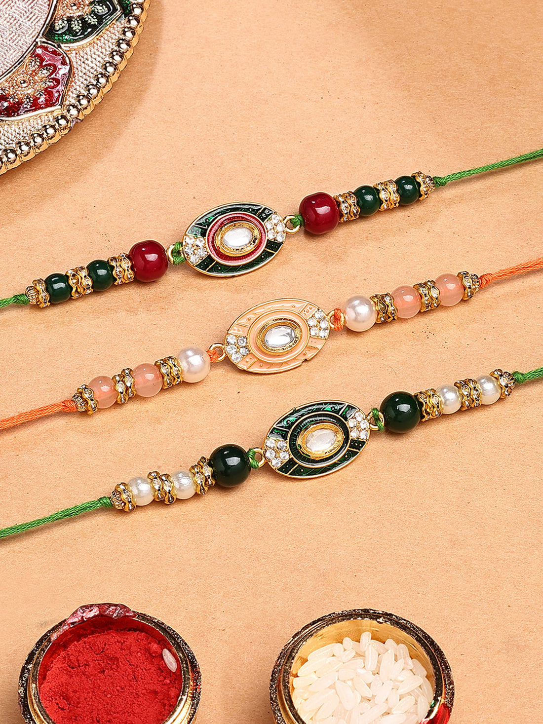 Karatcart Set of 3 Green and Pink Enamel Floral Design Rakhi for Brother with Roli & Chawal