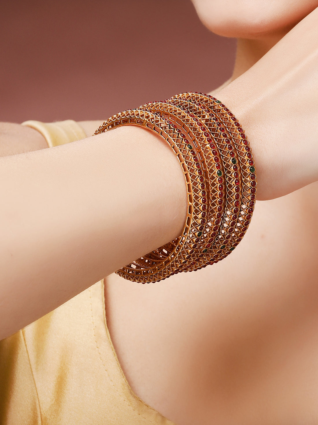 Karatcart Antique Gold Plated Set of 4 Traditional Red Stone Bangles for Women