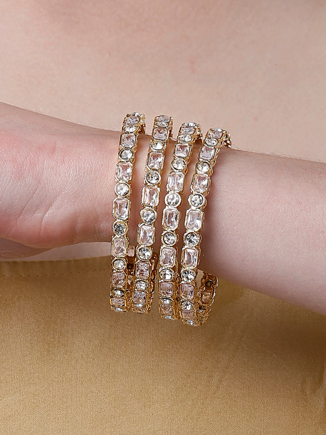 Karatcart Set of 4 American Diamond Studded Gold Plated Bangles for Women