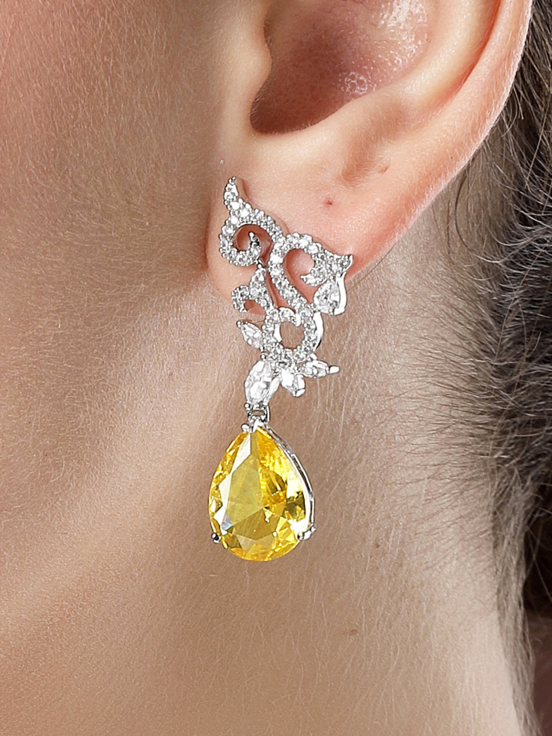 Karatcart Silver Plated Floral Shape Yellow American Diamond Studs for Women