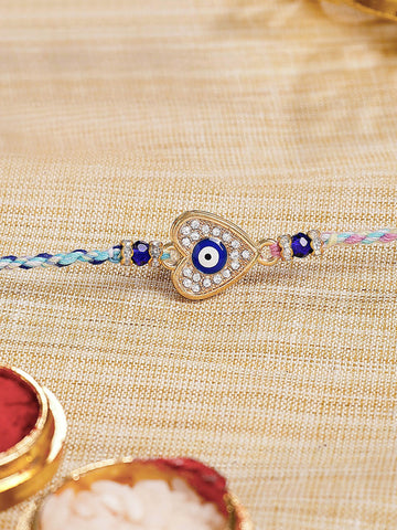 KARATCART Gold Plated Blue American Diamond Heart Shape Evil Eye Bhaiya Rakhi with Roli & Chawal