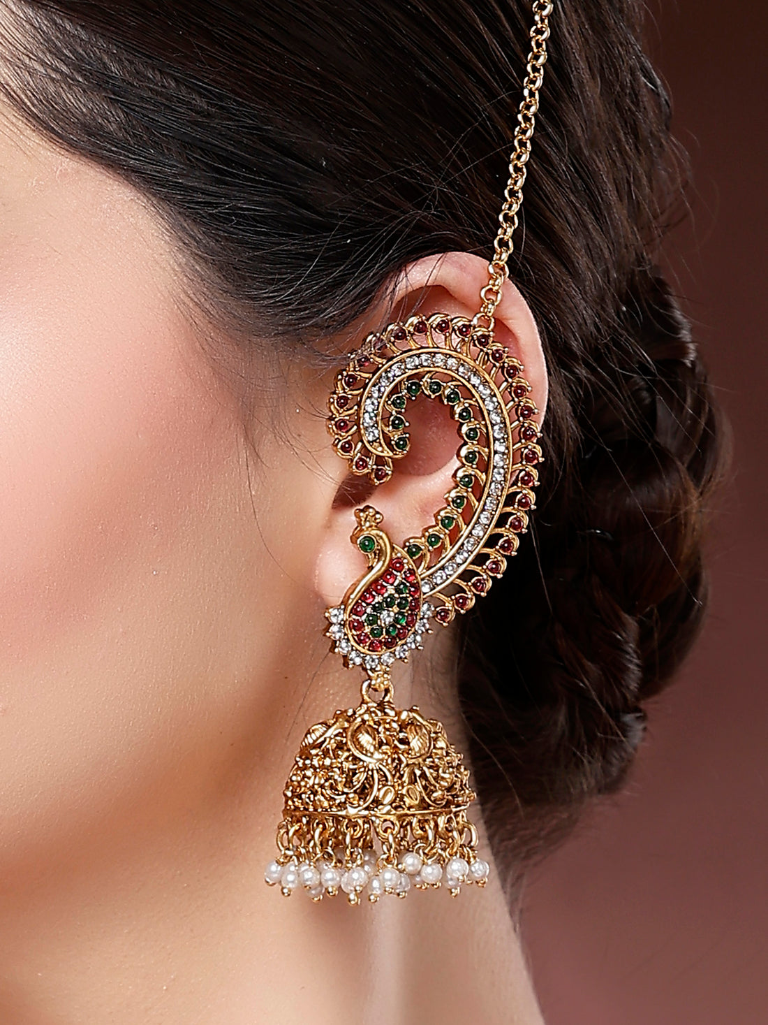 Karatcart Royal Spiral Peacock Gold-Plated Jhumka Earrings with Ear Chains
