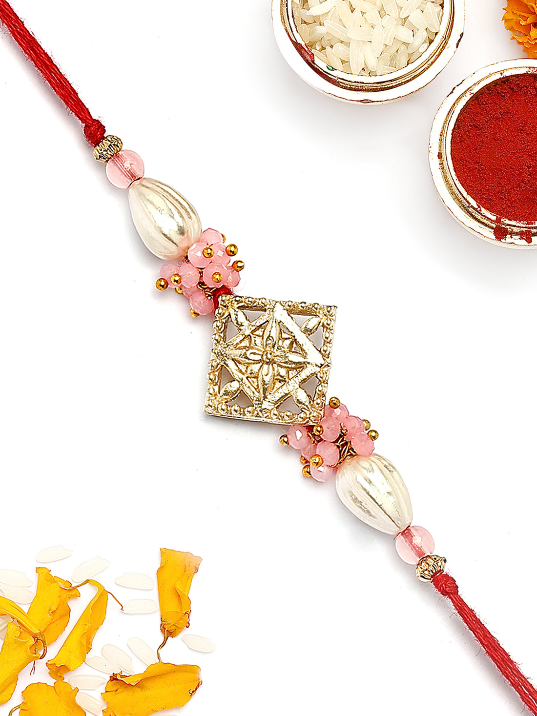 KARATCART Gold Plated Pink Crystal and Pearl Kundan Bhaiya Rakhi with Roli & Chawal