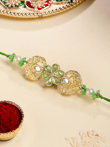 KARATCART Gold Plated Lime Green Crystal Floral Kundan Bhaiya Rakhi with Roli & Chawal