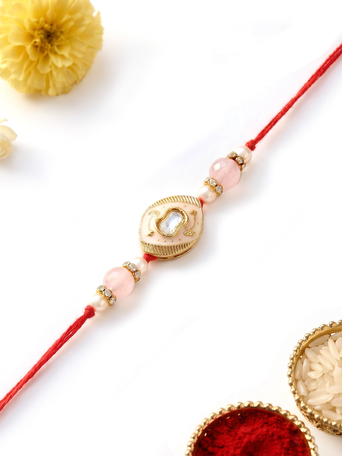 KARATCART Beautiful Peach Meena Oval Shape Handmade Kundan Rakhi for Brother with Roli & Chawal