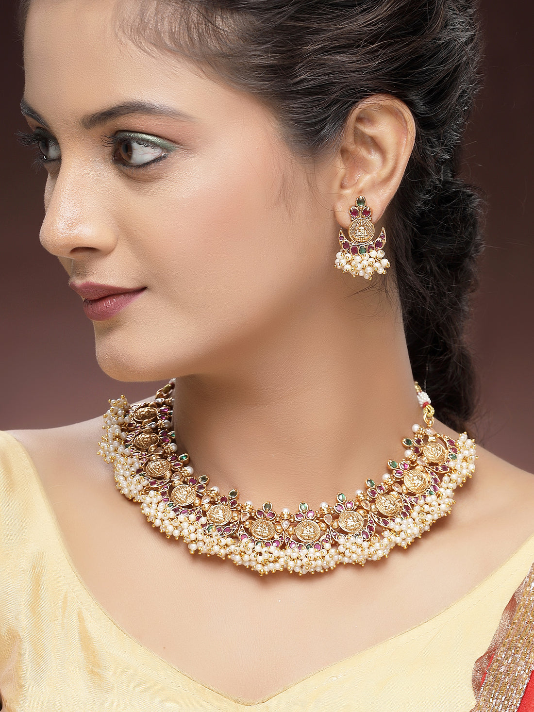KARATCART Gold-Plated South Indian Laxmi Mata Coin Temple Jewellery Set with Red and Green Stones