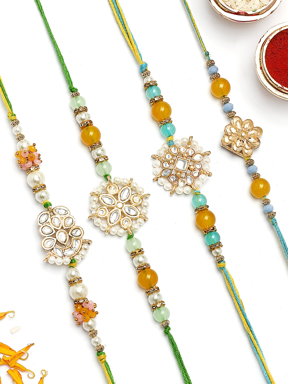KARATCART Set of 4 Floral Kundan Rakhi for Brother with Roli & Chawal