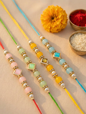 KARATCART Set of 4 Pastel Beaded Designer Kundan Rakhi for Brother with Roli & Chawal