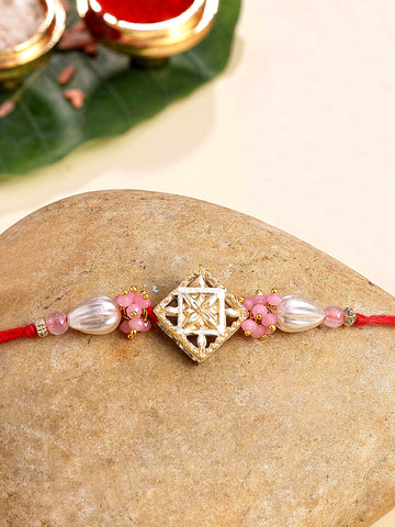 KARATCART Gold Plated Pink Crystal and Pearl Kundan Bhaiya Rakhi with Roli & Chawal