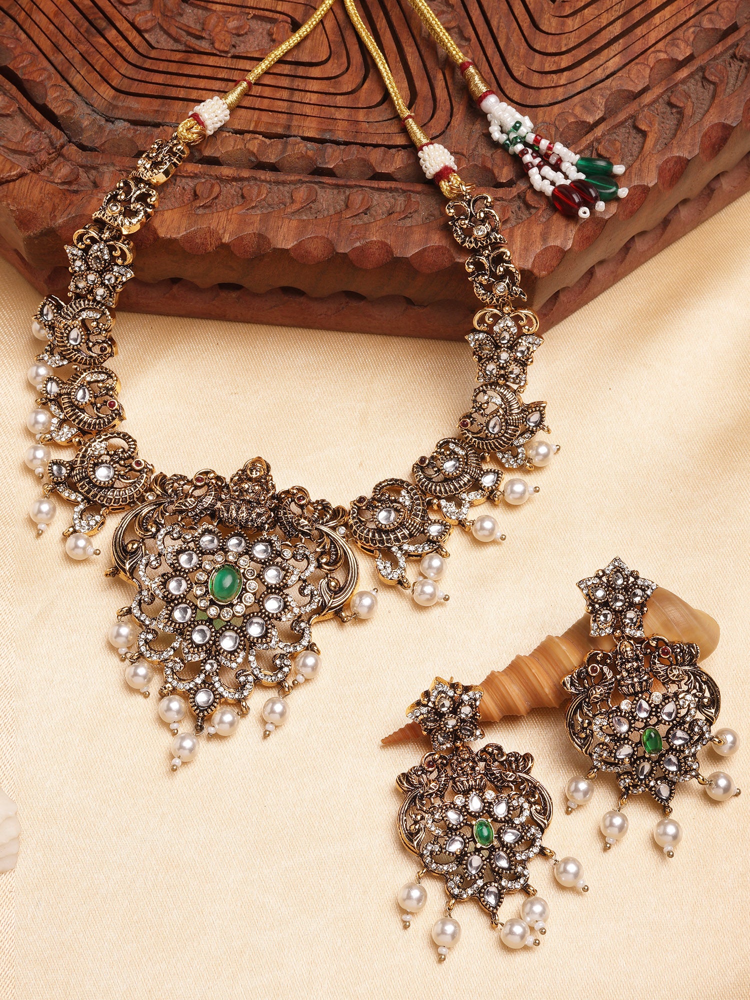 Karatcart Antique Gold Plated Green Stone Temple Jewellery Set for Women