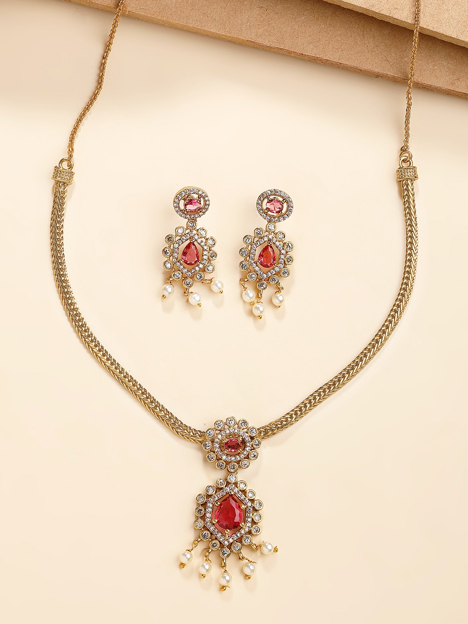 KARATCART Elegant Gold-Plated Red Drop American Diamond and Pearl Jewellery Set for Women - Image 1